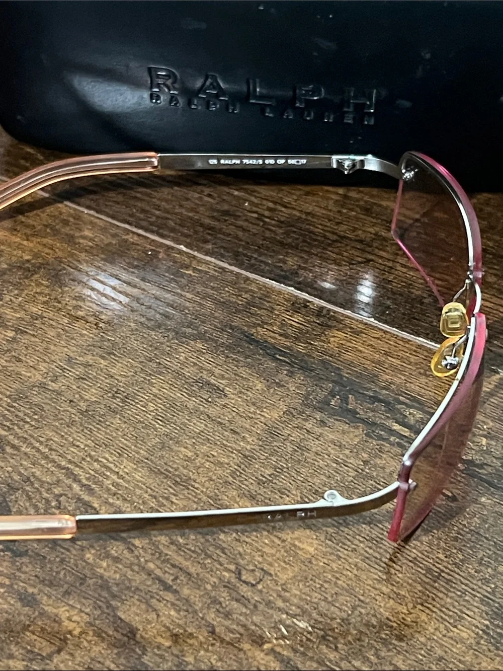 Ralph Lauren women’s Brown-Tinted Rimless Sunglasses pink